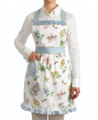 Home chefs stay fresh in the kitchen with the Butterfly Meadow apron by Lenox. Sweet blooms and butterflies, ruffled blue accents and leafy green trim evoke the cheery essence of spring in pure cotton. Home chefs stay fresh in the kitchen with the Butterfly Meadow apron by Lenox. Sweet blooms and butterflies, ruffled blue accents and leafy green trim evoke the cheery essence of spring in pure cotton.