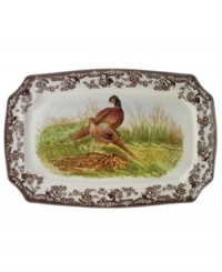Bring the classic style of the English countryside to your table with the Woodland Collection. This traditionally patterned rectangular platter features the majestic pheasant framed by Spode's distinctive British Flowers border, which dates back to 1828. Bring the classic style of the English countryside to your table with the Woodland Collection. This traditionally patterned rectangular platter features the majestic pheasant framed by Spode's distinctive British Flowers border, which dates back to 1828.