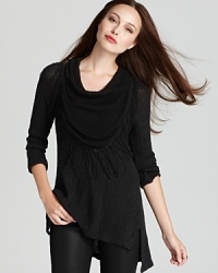 Chic, understated and always appropriate, this XCVI sweater modernizes classic diamond knit with an edgy angled hem. Chic, understated and always appropriate, this XCVI sweater modernizes classic diamond knit with an edgy angled hem.