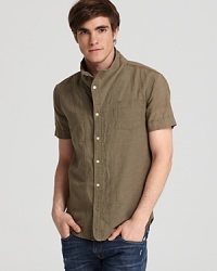 Make a statement with this uber-hip Diesel shirt, designed with a bold shaped wire collar and rendered in a fine, comfortable blend of linen and cotton. Make a statement with this uber-hip Diesel shirt, designed with a bold shaped wire collar and rendered in a fine, comfortable blend of linen and cotton.