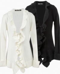 Rich ruffles. The sweet, flowy ruffles on this cardigan from Planet Gold is the perfect layering piece. Rich ruffles. The sweet, flowy ruffles on this cardigan from Planet Gold is the perfect layering piece.