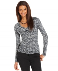 This leopard-print top from DKNY Jeans adds a fierce touch to any ensemble. Pair it with skinny pants and pointy boots for everyday style with a downtown twist. This leopard-print top from DKNY Jeans adds a fierce touch to any ensemble. Pair it with skinny pants and pointy boots for everyday style with a downtown twist.