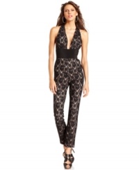 Stunning. Striking. Sexy. Make those statements and more in BCBGMAXAZRIA's sultry lace jumpsuit, featuring a deep, dramatic neckline and banded waist. Stunning. Striking. Sexy. Make those statements and more in BCBGMAXAZRIA's sultry lace jumpsuit, featuring a deep, dramatic neckline and banded waist.