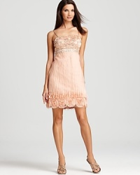 Shoulder-to-hem embellishments make an unforgettable statement on this Sue Wong dress. Shoulder-to-hem embellishments make an unforgettable statement on this Sue Wong dress.