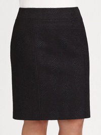 At first glance, it seems like a classic woven skirt, until you look closer at its rich, snakeskin texture.Wide smooth waistband with back V shaping and elastic insetSide zip closureSeamed detailZip-close center back ventFully linedKnee lengthPolyesterDry cleanImported At first glance, it seems like a classic woven skirt, until you look closer at its rich, snakeskin texture.Wide smooth waistband with back V shaping and elastic insetSide zip closureSeamed detailZip-close center back ventFully linedKnee lengthPolyesterDry cleanImported