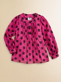 She'll be the cat's meow in this airy cotton blouse with a pintucked bib and fancy feline print.Round necklineLong sleeves with button cuffsCollar buttonPintucked bibFlared hemCottonHand washImported Please note: Number of buttons may vary depending on size ordered. She'll be the cat's meow in this airy cotton blouse with a pintucked bib and fancy feline print.Round necklineLong sleeves with button cuffsCollar buttonPintucked bibFlared hemCottonHand washImported Please note: Number of buttons may vary depending on size ordered.