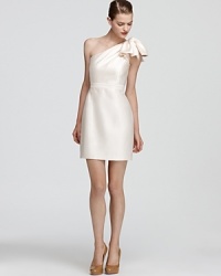 Crafted in pure silk, this feminine Shoshanna dress boasts an oversize bow on a one-shouldered silhouette. Crafted in pure silk, this feminine Shoshanna dress boasts an oversize bow on a one-shouldered silhouette.