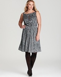 A classic Jones New York Collection Plus dress gets a contemporary update as an abstract print injects the style with modern allure. A classic Jones New York Collection Plus dress gets a contemporary update as an abstract print injects the style with modern allure.