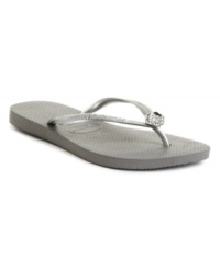 Finished with a flower. Havaianas topped the classic Harmony flip flops with a sparkling flower charm. Finished with a flower. Havaianas topped the classic Harmony flip flops with a sparkling flower charm.