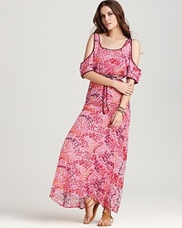 Imbue your day with the cheerful style of this KAS New York maxi dress, boasting a rainbow-hued print that pops with personality. The sweeping silhouette is as playful as it is elegant, expressing your fresh femininity and love for the summer. Imbue your day with the cheerful style of this KAS New York maxi dress, boasting a rainbow-hued print that pops with personality. The sweeping silhouette is as playful as it is elegant, expressing your fresh femininity and love for the summer.