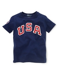 A sporty tee in soft breathable cotton is accented with heritage pride, celebrating Team USA's participation in the 2012 Olympics.Contrast ribbed crew neckline. A sporty tee in soft breathable cotton is accented with heritage pride, celebrating Team USA's participation in the 2012 Olympics.Contrast ribbed crew neckline.