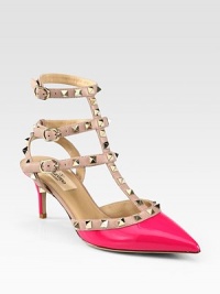 A scintillating hue freshens this patent t-strap pump, with leather trim and signature metal studs. Patent leather-covered heel, 2¾ (70mm)Patent leather upper with leather trim and metal studsPoint toeAdjustable leather ankle strapsLeather lining and solePadded insoleMade in Italy A scintillating hue freshens this patent t-strap pump, with leather trim and signature metal studs. Patent leather-covered heel, 2¾ (70mm)Patent leather upper with leather trim and metal studsPoint toeAdjustable leather ankle strapsLeather lining and solePadded insoleMade in Italy