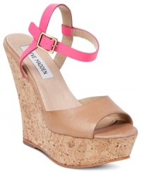 The sky's the limit when you look this cute. Steve Madden's Whatif platform wedge sandals pair neutral shades with a pop of color, thanks to the bright pink ankle strap. The sky's the limit when you look this cute. Steve Madden's Whatif platform wedge sandals pair neutral shades with a pop of color, thanks to the bright pink ankle strap.