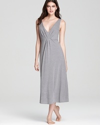 Rendered in a lightweight knit with a flattering v-neck, this Natori nightgown is simply chic. Rendered in a lightweight knit with a flattering v-neck, this Natori nightgown is simply chic.