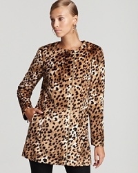 Melding exotic attitude with chic elegance, this Calvin Klein jacket flaunts a minimalist silhouette enlivened by fierce leopard print. Melding exotic attitude with chic elegance, this Calvin Klein jacket flaunts a minimalist silhouette enlivened by fierce leopard print.