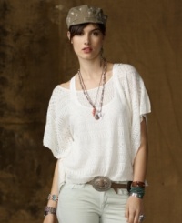 Flirty and feminine in a delicate pointelle knit, Denim & Supply Ralph Lauren's cotton poncho embodies the laid-back style of summer in a loose, bohemian-inspired silhouette. Flirty and feminine in a delicate pointelle knit, Denim & Supply Ralph Lauren's cotton poncho embodies the laid-back style of summer in a loose, bohemian-inspired silhouette.