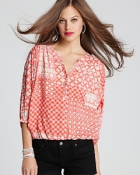 Tap into summer's hippie-chic vibe with this Ella Moss top, emboldened by a global-inspired print. Tap into summer's hippie-chic vibe with this Ella Moss top, emboldened by a global-inspired print.