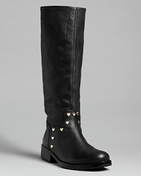 Adore the equestrian look? Pull on these Love Moschino riding boots, punched up with the sweetest heart-shaped studs. Adore the equestrian look? Pull on these Love Moschino riding boots, punched up with the sweetest heart-shaped studs.