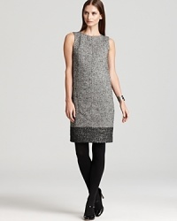 The classic Jones New York Collection tweed dress gets a new season spin with crisp color blocking and chic luster. The classic Jones New York Collection tweed dress gets a new season spin with crisp color blocking and chic luster.