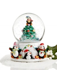 In this most adorable holiday keepsake from Holiday Lane, four festive penguins celebrate the season as the traditional tune of Jingle Bells plays and shimmering snow falls all around them. In this most adorable holiday keepsake from Holiday Lane, four festive penguins celebrate the season as the traditional tune of Jingle Bells plays and shimmering snow falls all around them.