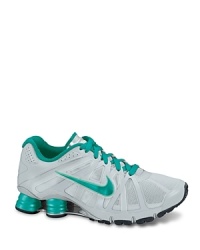 This sporty, versatile training shoe delivers the responsive cushioning of Nike Shox technology in a sleek, athletic package. This sporty, versatile training shoe delivers the responsive cushioning of Nike Shox technology in a sleek, athletic package.