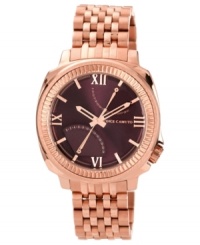 A modern timepiece from Vince Camuto with the handsome pairing of brown and rose. A modern timepiece from Vince Camuto with the handsome pairing of brown and rose.