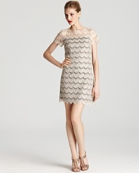 In sparkling lace, Ali Ro's sophisticated short sleeve dress lends a classic look in a neutral hue. In sparkling lace, Ali Ro's sophisticated short sleeve dress lends a classic look in a neutral hue.