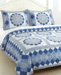 Blue blossoms in an array of fabrics create a mosaic of pure tranquility. The Blue Dahlia quilt set is hand-pieced for a traditional look and feel that makes a wonderful update for master and guest bedrooms alike. (Clearance) Blue blossoms in an array of fabrics create a mosaic of pure tranquility. The Blue Dahlia quilt set is hand-pieced for a traditional look and feel that makes a wonderful update for master and guest bedrooms alike. (Clearance)