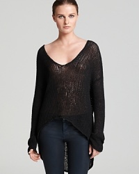 A lightweight, loose knit Helmut Lang sweater transitions you into fall with flawless style, ever so cool with dark-wash jeans and moto boots. A lightweight, loose knit Helmut Lang sweater transitions you into fall with flawless style, ever so cool with dark-wash jeans and moto boots.