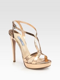 Metallic leather criss-cross platform sandal with a slim heel. Self-covered heel, 5 (125mm)Covered platform, 1 (25mm)Compares to a 4 heel (100mm)Metallic leather upperLeather lining and solePadded insoleMade in ItalyOUR FIT MODEL RECOMMENDS ordering true size. Metallic leather criss-cross platform sandal with a slim heel. Self-covered heel, 5 (125mm)Covered platform, 1 (25mm)Compares to a 4 heel (100mm)Metallic leather upperLeather lining and solePadded insoleMade in ItalyOUR FIT MODEL RECOMMENDS ordering true size.