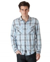 Get that laid-back look that is all casual cool with this weathered plaid shirt from Calvin Klein Jeans. Get that laid-back look that is all casual cool with this weathered plaid shirt from Calvin Klein Jeans.