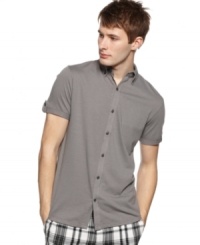 This short-sleeved shirt from Kenneth Cole Reaction is long on style. This short-sleeved shirt from Kenneth Cole Reaction is long on style.