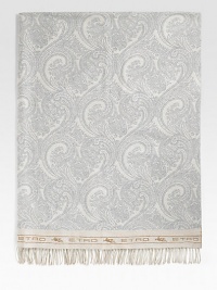 A stunning addition to any home in soft, lightweight wool that's embroidered by hand with a delicate paisley pattern. Fringed ends 55 X 71 Wool Dry clean Made in Italy A stunning addition to any home in soft, lightweight wool that's embroidered by hand with a delicate paisley pattern. Fringed ends 55 X 71 Wool Dry clean Made in Italy