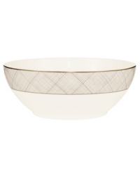 Dressed in a fine diamond grid of bronze and warm taupe, this large round bowl is tailored for formal dining and everyday elegance in bone china. From Noritake's collection of serveware and serving dishes. Dressed in a fine diamond grid of bronze and warm taupe, this large round bowl is tailored for formal dining and everyday elegance in bone china. From Noritake's collection of serveware and serving dishes.
