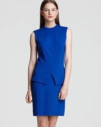 Structured and svelte, this sleeveless dress from Tibi features structured seaming details and a crisscross cutout peplum waist - a fabulous transition dress for work to dinner. Structured and svelte, this sleeveless dress from Tibi features structured seaming details and a crisscross cutout peplum waist - a fabulous transition dress for work to dinner.