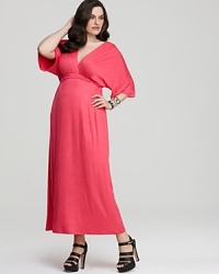Cut to flatter, this Melissa Masse dress is designed in flowing jersey with short, fluttery sleeves and a flowing maxi skirt. Cut to flatter, this Melissa Masse dress is designed in flowing jersey with short, fluttery sleeves and a flowing maxi skirt.