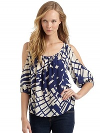 THE LOOKLarge pixel printScoopneckCutout shouldersThree-quarter length sleeves with elastic cuffsCurved hemTHE FITAbout 25 from shoulder to hemTHE MATERIALSilkCARE & ORIGINDry cleanMade in USAModel shown is 5'8 (172½cm) wearing US size Small. THE LOOKLarge pixel printScoopneckCutout shouldersThree-quarter length sleeves with elastic cuffsCurved hemTHE FITAbout 25 from shoulder to hemTHE MATERIALSilkCARE & ORIGINDry cleanMade in USAModel shown is 5'8 (172½cm) wearing US size Small.