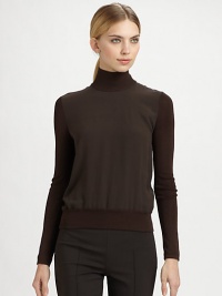 Silk front panel makes this knit a sleek option under any jacket or on its own. TurtleneckLong sleevesRib-knit hemlineSilkDry cleanMade in SwitzerlandModel shown is 5'11 (180cm) wearing US size 4. Silk front panel makes this knit a sleek option under any jacket or on its own. TurtleneckLong sleevesRib-knit hemlineSilkDry cleanMade in SwitzerlandModel shown is 5'11 (180cm) wearing US size 4.
