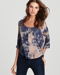 A splashy tie-dye print imbues this billowy Splendid top with an artistic spirit. A splashy tie-dye print imbues this billowy Splendid top with an artistic spirit.