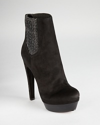 Rachel Zoe's fashion-forward Audrey booties forgo the typical elastic goring for genuine snakeskin. Combined with soft suede, these highly-covetable platforms are the height of luxe. Rachel Zoe's fashion-forward Audrey booties forgo the typical elastic goring for genuine snakeskin. Combined with soft suede, these highly-covetable platforms are the height of luxe.
