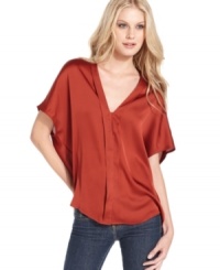 In a stylishly slouchy shape, this slinky satin Kensie blouse is perfect for dressing up denim! In a stylishly slouchy shape, this slinky satin Kensie blouse is perfect for dressing up denim!