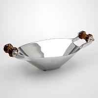 This hand-crafted bowl features dark amber glass handles with exquisitely hand-polished metal.