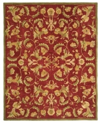 Bold burgundy houses an intricate assortment of intertwined blossoms and vines on this Turkish-inspired area rug from Safavieh. Pure wool is hand-tufted in a thick three-quarter-inch pile, finished with a cotton backing for long-lasting durability. Bold burgundy houses an intricate assortment of intertwined blossoms and vines on this Turkish-inspired area rug from Safavieh. Pure wool is hand-tufted in a thick three-quarter-inch pile, finished with a cotton backing for long-lasting durability.
