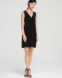 A subtle ruffle lends movement to this modern Tibi dress in a stunningly simple silhouette. Pair with sleek heels for minimalist chic. A subtle ruffle lends movement to this modern Tibi dress in a stunningly simple silhouette. Pair with sleek heels for minimalist chic.