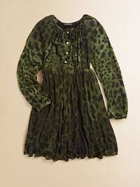 Long-sleeved, knit frock adorned with a bold leopard print and finished with pearl-like buttons and a full skirt.Round neckline with tieLong sleevesFront buttonsElastic waistbandFull skirtModalMachine washImported Please note: Number of buttons may vary depending on size ordered. Long-sleeved, knit frock adorned with a bold leopard print and finished with pearl-like buttons and a full skirt.Round neckline with tieLong sleevesFront buttonsElastic waistbandFull skirtModalMachine washImported Please note: Number of buttons may vary depending on size ordered.