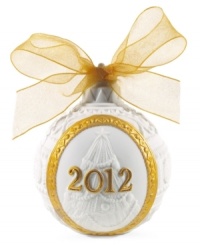 Make it the most elegant Christmas yet with this handmade porcelain ornament from Lladro. A beautiful bow, embossed candy canes and radiant gold accents make the 2012 tree one you'll always remember. Make it the most elegant Christmas yet with this handmade porcelain ornament from Lladro. A beautiful bow, embossed candy canes and radiant gold accents make the 2012 tree one you'll always remember.