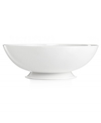 Keep it simple. In glossy white porcelain, this footed serving bowl is a flawless accompaniment to any dinnerware pattern and decor. From Martha Stewart Collection. Keep it simple. In glossy white porcelain, this footed serving bowl is a flawless accompaniment to any dinnerware pattern and decor. From Martha Stewart Collection.