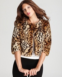 Your style will be spot on in this DKNY faux-fur jacket flaunting a chic cropped silhouette for a thoroughly modern statement. Your style will be spot on in this DKNY faux-fur jacket flaunting a chic cropped silhouette for a thoroughly modern statement.