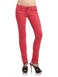 THE LOOKTonal ikat printWide waistband with belt loopsFront button closure with zip flyFive-pocket styleRemovable logo charm at belt loopSkinny legsPyramid studs at back pocketTHE FITRise, about 7Inseam, about 28THE MATERIAL43% lyocell/26% cotton/17% rayon/13% polyester/1% spandexCARE & ORIGINMachine washImported of domestic fabricModel shown is 5'10 (177cm) wearing US size 4. THE LOOKTonal ikat printWide waistband with belt loopsFront button closure with zip flyFive-pocket styleRemovable logo charm at belt loopSkinny legsPyramid studs at back pocketTHE FITRise, about 7Inseam, about 28THE MATERIAL43% lyocell/26% cotton/17% rayon/13% polyester/1% spandexCARE & ORIGINMachine washImported of domestic fabricModel shown is 5'10 (177cm) wearing US size 4.