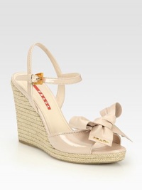 EXCLUSIVELY AT SAKS. Patent leather style with espadrille wedge, bow, and logo detail. Hemp-covered wedge, 4 (100mm)Hemp-covered platform, ½ (15mm)Compares to a 3½ heel (90mm)Patent leather upperLeather liningRubber solePadded insoleImportedOUR FIT MODEL RECOMMENDS ordering true size. EXCLUSIVELY AT SAKS. Patent leather style with espadrille wedge, bow, and logo detail. Hemp-covered wedge, 4 (100mm)Hemp-covered platform, ½ (15mm)Compares to a 3½ heel (90mm)Patent leather upperLeather liningRubber solePadded insoleImportedOUR FIT MODEL RECOMMENDS ordering true size.